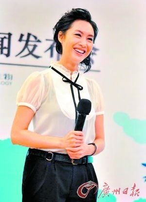 朱茵呼吁保護小動物 學生裝亮相拒談星爺(圖)